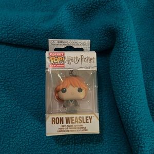 Vinyl figure keychain, Ron Weasley. New, never opened.